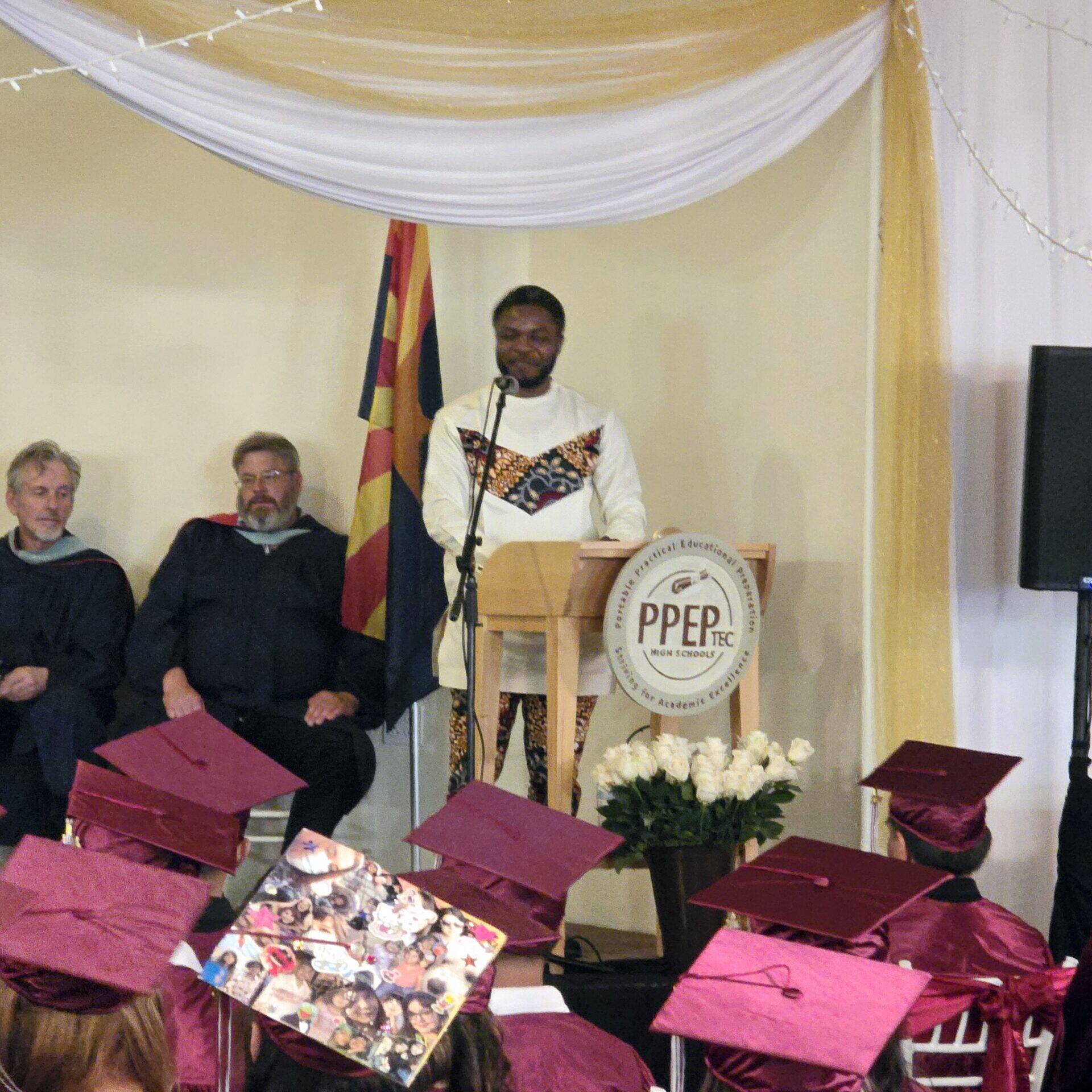 Dr. Emma giving a speech at the PPE graduation ceremony.